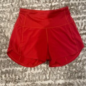 Lululemon Speed Up Shorts Size 0, Tall, Poppy color. Excellent Condition.